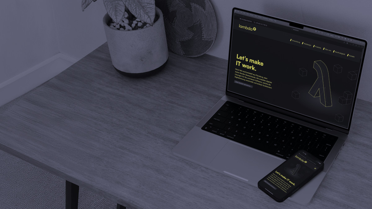 Die Website der lambda9 wird auf einem Laptop und Smartphone dargestellt.